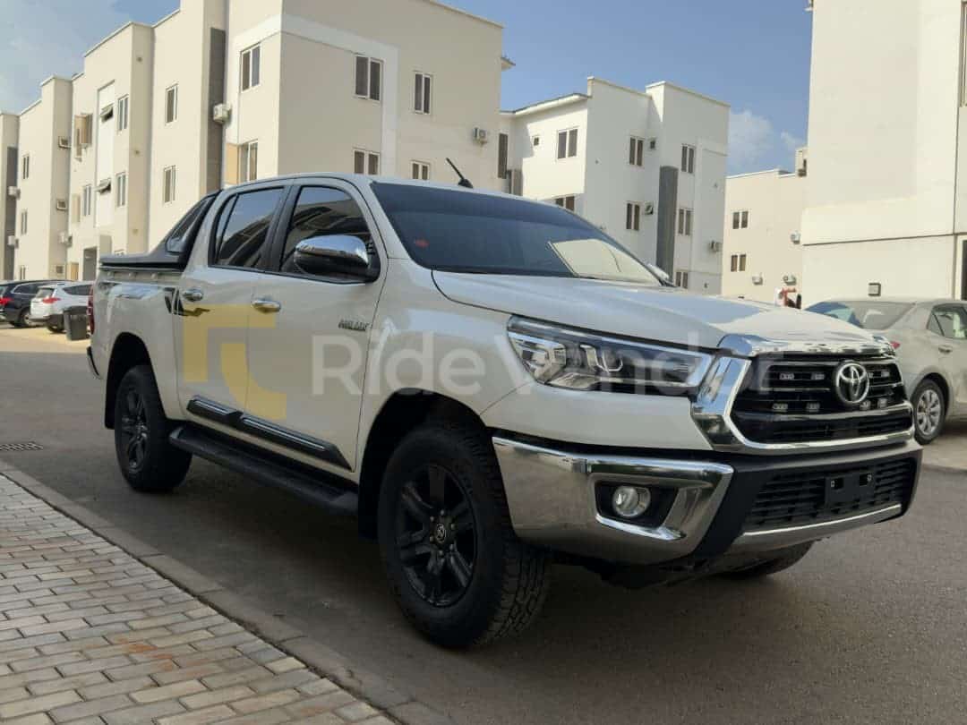 2025 Toyota Hilux SR5 available for chauffeur-driven car hire in Nigeria