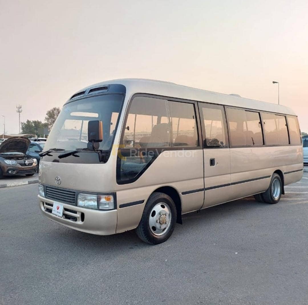 Toyota Coaster 30-Seater Bus available for car hire in Abuja